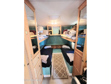 GIVE THE GIFT OF YOUR OWN PLACE AT THE BEACH! SELLER IS on North Shore Country Club in North Carolina - for sale on GolfHomes.com, golf home, golf lot