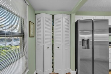 Beautifully updated FIRST-FLOOR furnished turnkey gem-a on Vista Plantation Golf Club in Florida - for sale on GolfHomes.com, golf home, golf lot