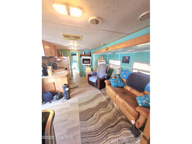 GIVE THE GIFT OF YOUR OWN PLACE AT THE BEACH! SELLER IS on North Shore Country Club in North Carolina - for sale on GolfHomes.com, golf home, golf lot