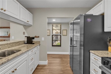 Beautifully updated FIRST-FLOOR furnished turnkey gem-a on Vista Plantation Golf Club in Florida - for sale on GolfHomes.com, golf home, golf lot