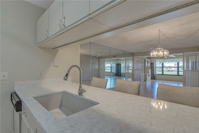 PRIME LOCATION-END UNIT only STEPS AWAY from heated on Vista Plantation Golf Club in Florida - for sale on GolfHomes.com, golf home, golf lot