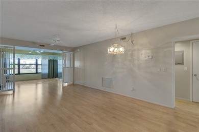 PRIME LOCATION-END UNIT only STEPS AWAY from heated on Vista Plantation Golf Club in Florida - for sale on GolfHomes.com, golf home, golf lot