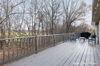 Welcome to 2202 Burton Pointe a lovely all-brick walkout ranch on Watermark Country Club in Michigan - for sale on GolfHomes.com, golf home, golf lot