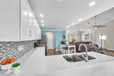 Welcome to your peaceful Apollo Beach retreat--tasteful on Apollo Beach Golf and Sea Club in Florida - for sale on GolfHomes.com, golf home, golf lot