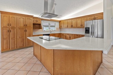 Nestled in the gated Country Club Estates in the heart of the on St. Lucie Trail Golf Club in Florida - for sale on GolfHomes.com, golf home, golf lot