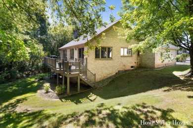 Welcome to 2202 Burton Pointe a lovely all-brick walkout ranch on Watermark Country Club in Michigan - for sale on GolfHomes.com, golf home, golf lot