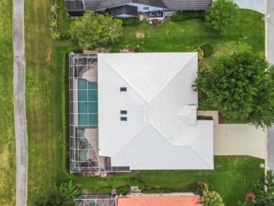 Nestled in the gated Country Club Estates in the heart of the on St. Lucie Trail Golf Club in Florida - for sale on GolfHomes.com, golf home, golf lot