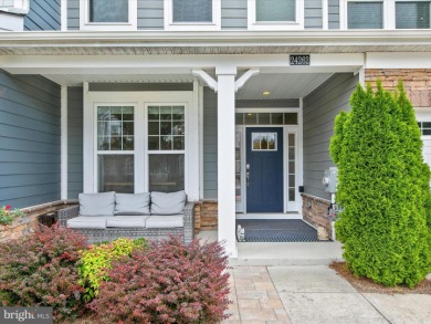 Welcome to 24262 Canoe Drive, an exquisite townhome villa on The Peninsula Golf and Country Club in Delaware - for sale on GolfHomes.com, golf home, golf lot