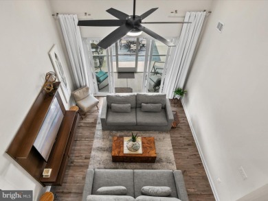 Welcome to 24262 Canoe Drive, an exquisite townhome villa on The Peninsula Golf and Country Club in Delaware - for sale on GolfHomes.com, golf home, golf lot