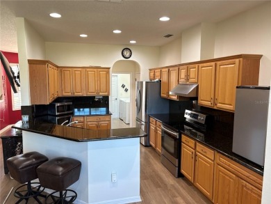 This beautiful 2006 three bedroom two bath home will not last on Candler Hills Golf and Country Club in Florida - for sale on GolfHomes.com, golf home, golf lot
