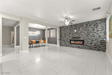 This beautifully renovated two-story home offers five bedrooms on Rhodes Ranch Golf Club in Nevada - for sale on GolfHomes.com, golf home, golf lot