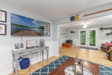 Experience lakefront living at its best in this beautiful on Tanglewood Shores Golf Club in Virginia - for sale on GolfHomes.com, golf home, golf lot