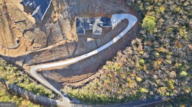 Brand new 50 year roof has been installed and the driveway has on The Orchard Golf and Country Club in Georgia - for sale on GolfHomes.com, golf home, golf lot