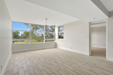 Fully renovated 2 bed/2 bath condo with additional room and on  in Florida - for sale on GolfHomes.com, golf home, golf lot