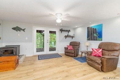 Experience lakefront living at its best in this beautiful on Tanglewood Shores Golf Club in Virginia - for sale on GolfHomes.com, golf home, golf lot