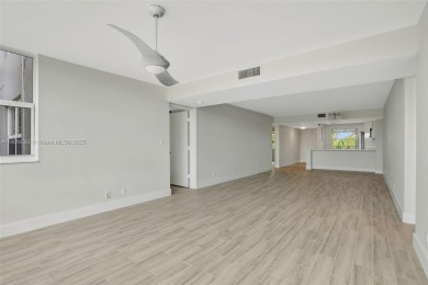 Fully renovated 2 bed/2 bath condo with additional room and on  in Florida - for sale on GolfHomes.com, golf home, golf lot