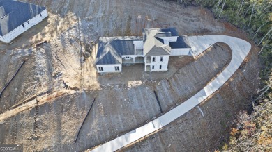 Brand new 50 year roof has been installed and the driveway has on The Orchard Golf and Country Club in Georgia - for sale on GolfHomes.com, golf home, golf lot