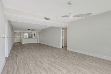Fully renovated 2 bed/2 bath condo with additional room and on  in Florida - for sale on GolfHomes.com, golf home, golf lot