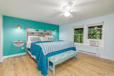 Experience lakefront living at its best in this beautiful on Tanglewood Shores Golf Club in Virginia - for sale on GolfHomes.com, golf home, golf lot