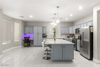 This beautifully renovated two-story home offers five bedrooms on Rhodes Ranch Golf Club in Nevada - for sale on GolfHomes.com, golf home, golf lot