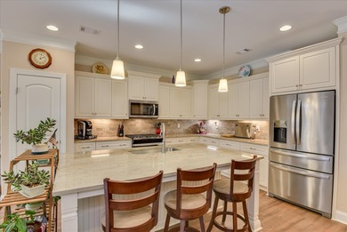 Exceptional Tea Olive Model with Premier Upgrades Discover on Monticello Golf Club At Savannah Lakes in South Carolina - for sale on GolfHomes.com, golf home, golf lot