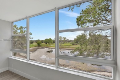 Fully renovated 2 bed/2 bath condo with additional room and on  in Florida - for sale on GolfHomes.com, golf home, golf lot