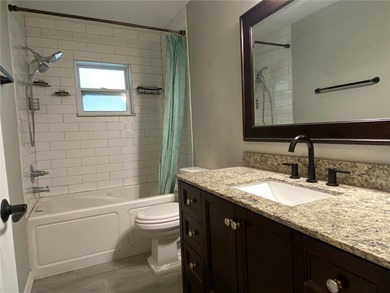 Charming and move-in ready block single family home featuring 2 on Zephyrhills Municipal Golf Course in Florida - for sale on GolfHomes.com, golf home, golf lot