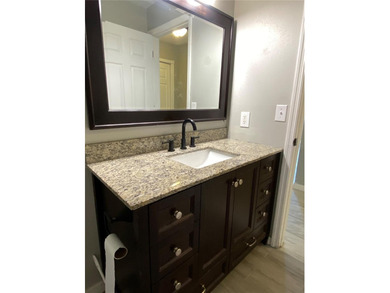 Charming and move-in ready block single family home featuring 2 on Zephyrhills Municipal Golf Course in Florida - for sale on GolfHomes.com, golf home, golf lot