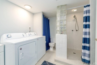 Experience lakefront living at its best in this beautiful on Tanglewood Shores Golf Club in Virginia - for sale on GolfHomes.com, golf home, golf lot