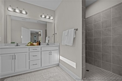 This beautiful two bedroom, two bathroom luxury condo in Fairway on Anderson Creek Golf Club in North Carolina - for sale on GolfHomes.com, golf home, golf lot