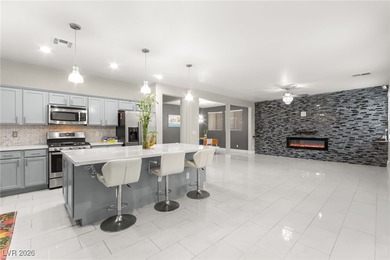 This beautifully renovated two-story home offers five bedrooms on Rhodes Ranch Golf Club in Nevada - for sale on GolfHomes.com, golf home, golf lot