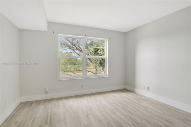 Fully renovated 2 bed/2 bath condo with additional room and on  in Florida - for sale on GolfHomes.com, golf home, golf lot