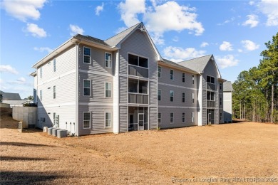 This beautiful two bedroom, two bathroom luxury condo in Fairway on Anderson Creek Golf Club in North Carolina - for sale on GolfHomes.com, golf home, golf lot