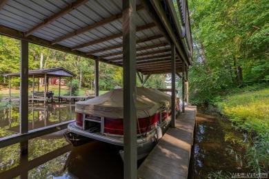 Experience lakefront living at its best in this beautiful on Tanglewood Shores Golf Club in Virginia - for sale on GolfHomes.com, golf home, golf lot