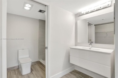 Fully renovated 2 bed/2 bath condo with additional room and on  in Florida - for sale on GolfHomes.com, golf home, golf lot