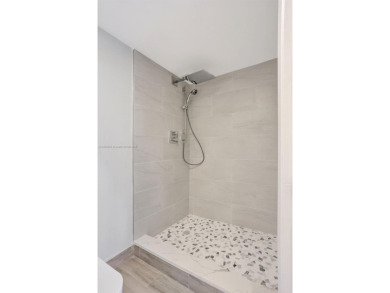 Fully renovated 2 bed/2 bath condo with additional room and on  in Florida - for sale on GolfHomes.com, golf home, golf lot