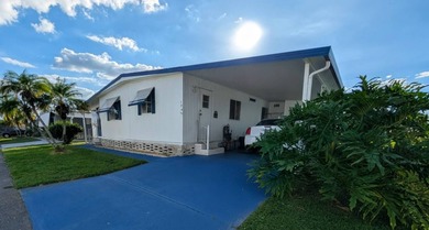 AFFORDABLE FLORIDA DREAM LIFESTYLE!  MOTIVATED SELLERS!   This on Grasslands Golf and Country Club in Florida - for sale on GolfHomes.com, golf home, golf lot