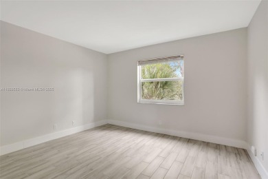 Fully renovated 2 bed/2 bath condo with additional room and on  in Florida - for sale on GolfHomes.com, golf home, golf lot