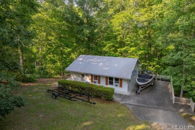 Experience lakefront living at its best in this beautiful on Tanglewood Shores Golf Club in Virginia - for sale on GolfHomes.com, golf home, golf lot