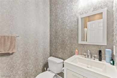 This beautifully renovated two-story home offers five bedrooms on Rhodes Ranch Golf Club in Nevada - for sale on GolfHomes.com, golf home, golf lot