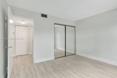 Fully renovated 2 bed/2 bath condo with additional room and on  in Florida - for sale on GolfHomes.com, golf home, golf lot