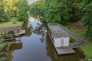 Experience lakefront living at its best in this beautiful on Tanglewood Shores Golf Club in Virginia - for sale on GolfHomes.com, golf home, golf lot