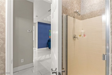 This beautifully renovated two-story home offers five bedrooms on Rhodes Ranch Golf Club in Nevada - for sale on GolfHomes.com, golf home, golf lot