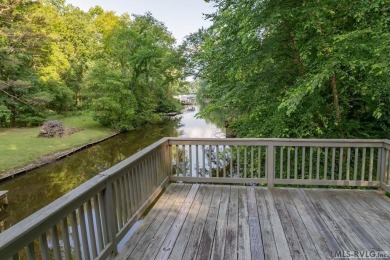 Experience lakefront living at its best in this beautiful on Tanglewood Shores Golf Club in Virginia - for sale on GolfHomes.com, golf home, golf lot