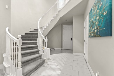 This beautifully renovated two-story home offers five bedrooms on Rhodes Ranch Golf Club in Nevada - for sale on GolfHomes.com, golf home, golf lot