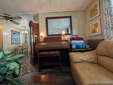 AFFORDABLE FLORIDA DREAM LIFESTYLE!  MOTIVATED SELLERS!   This on Grasslands Golf and Country Club in Florida - for sale on GolfHomes.com, golf home, golf lot