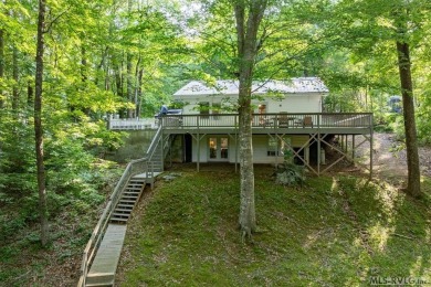 Experience lakefront living at its best in this beautiful on Tanglewood Shores Golf Club in Virginia - for sale on GolfHomes.com, golf home, golf lot