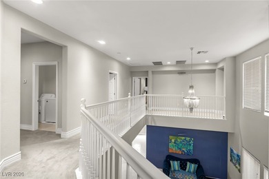 This beautifully renovated two-story home offers five bedrooms on Rhodes Ranch Golf Club in Nevada - for sale on GolfHomes.com, golf home, golf lot