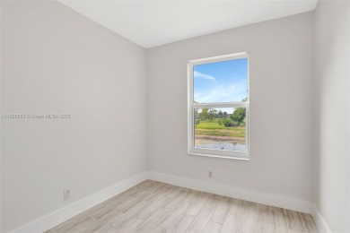 Fully renovated 2 bed/2 bath condo with additional room and on  in Florida - for sale on GolfHomes.com, golf home, golf lot