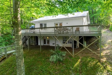 Experience lakefront living at its best in this beautiful on Tanglewood Shores Golf Club in Virginia - for sale on GolfHomes.com, golf home, golf lot
